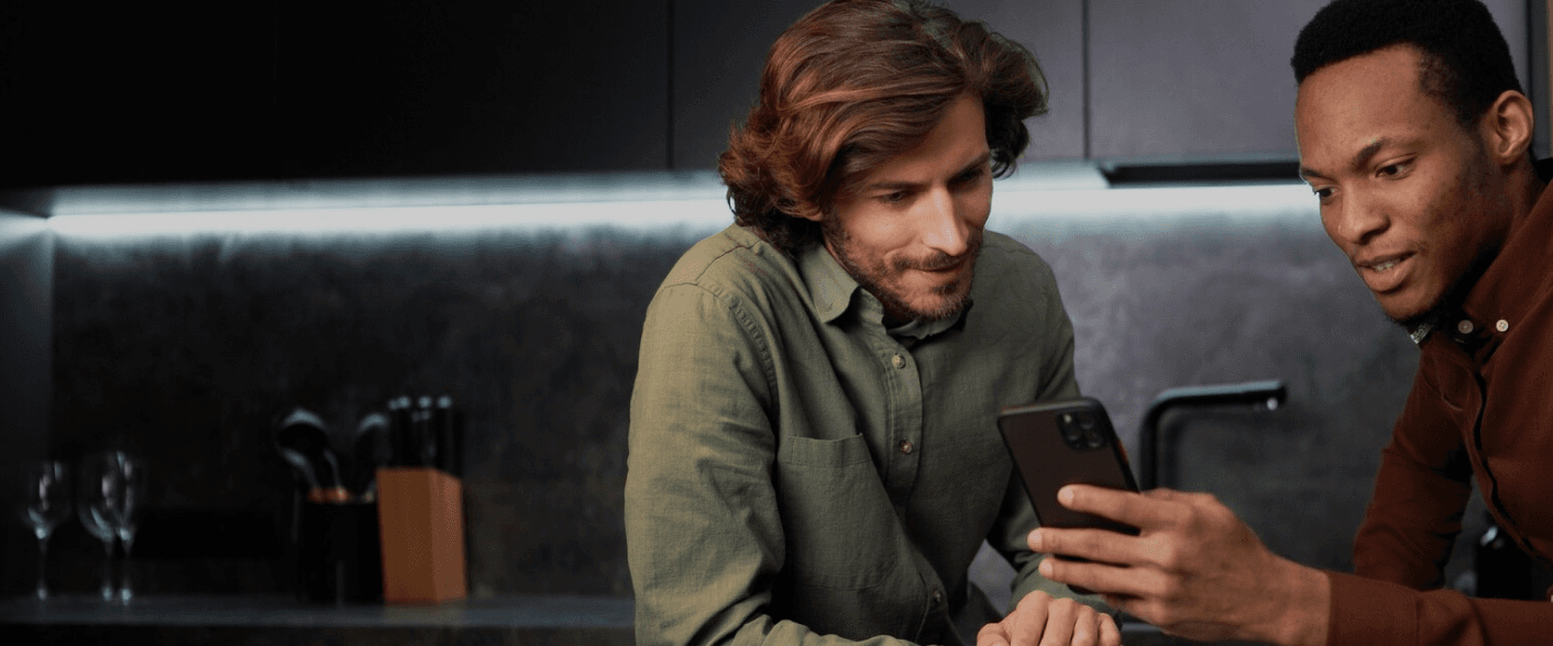 Two residents reviewing the wrinsy app together