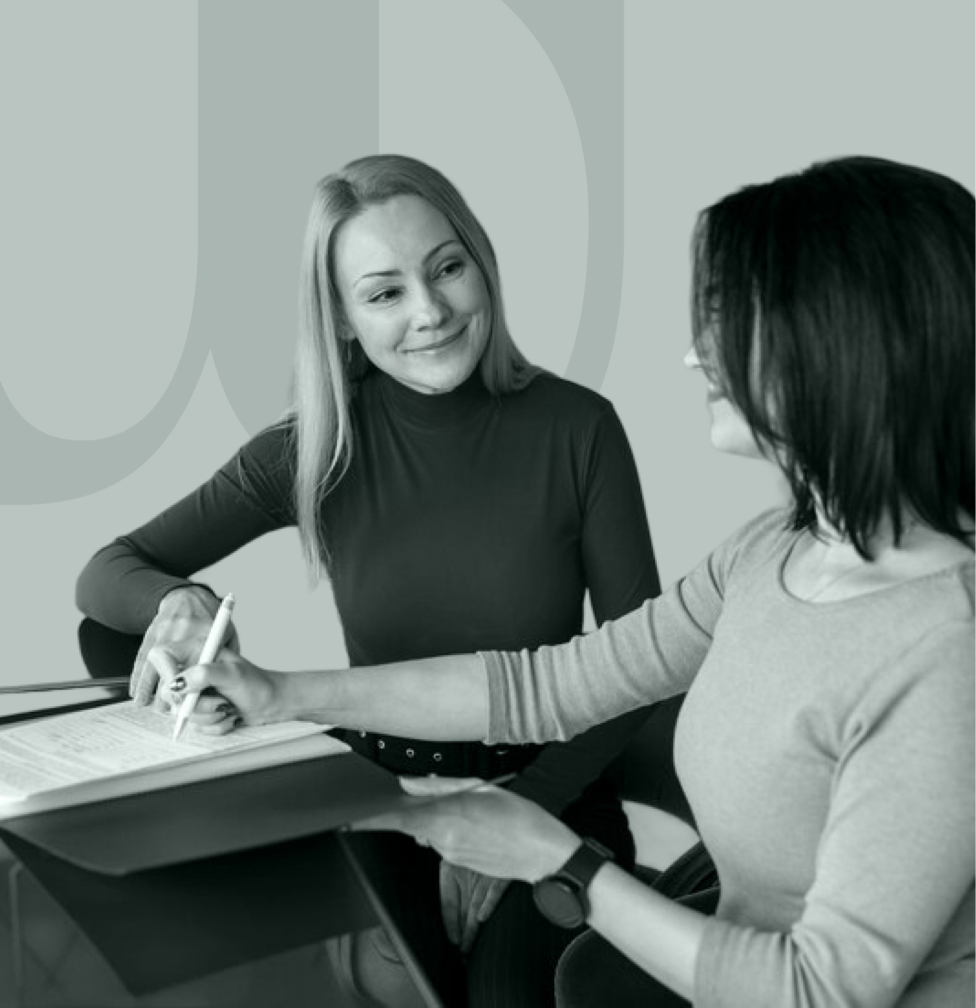 A property manager reviewing survey answers with a resident